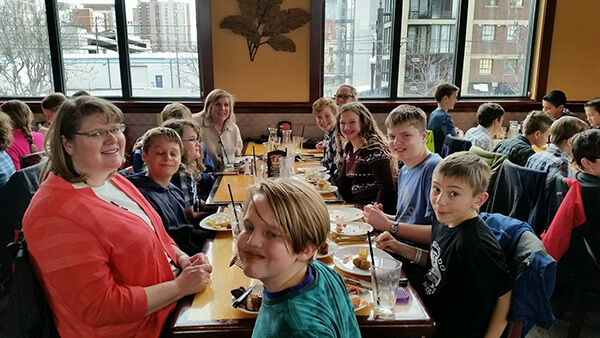students and chaperones eat lunch at Tucanos restaurant 