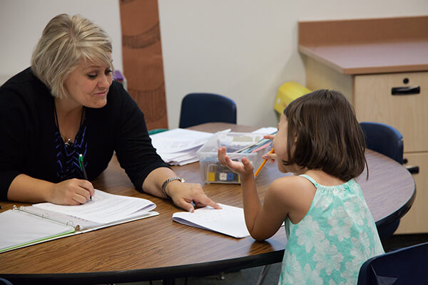 teacher with student