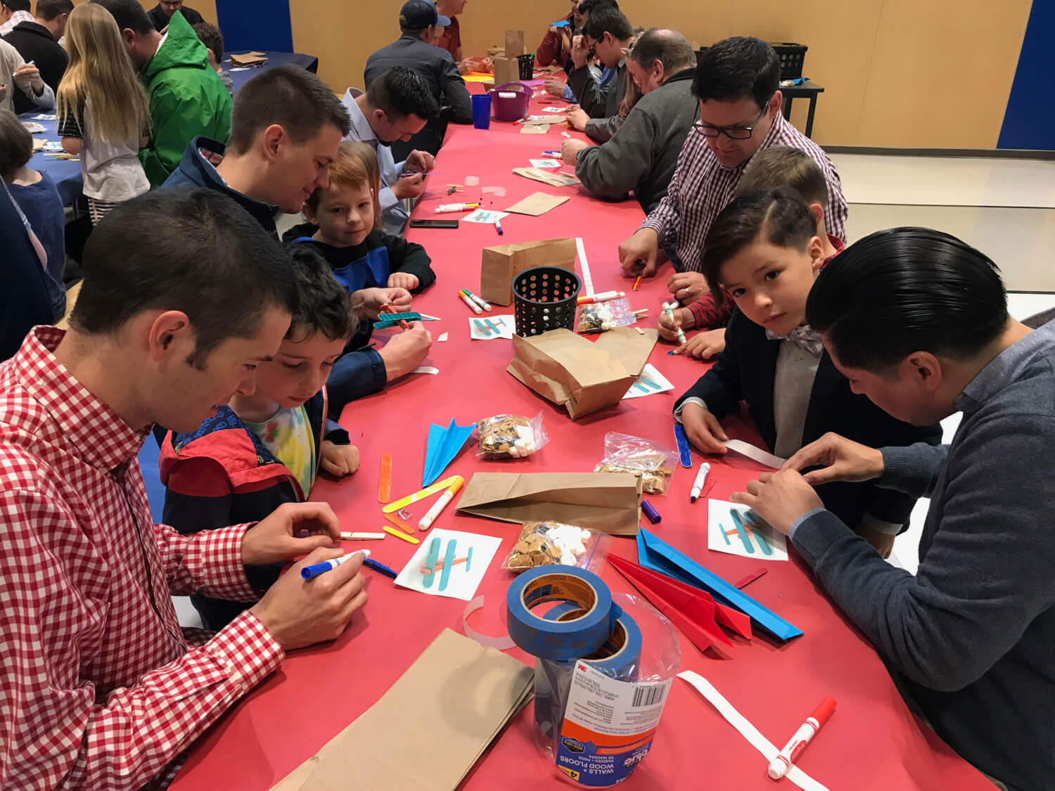 dads and students work on planes