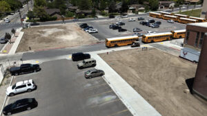 North parking lot next to Timpview Elementary with buses parked in the drop-off loop.