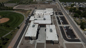 Drone shot of Shoreline Middle construction site, the parking lot, and surrounding road.