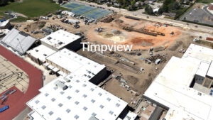 Drone shot of a muddy compacted construction lot