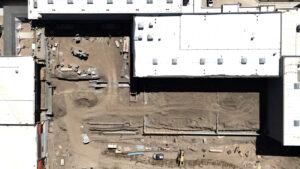 Bird's eye view drone shot of the same southwestern lot.