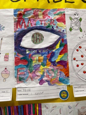 A "I Matter Because" Poster. It is a group winner, and says "I matter because I exist."